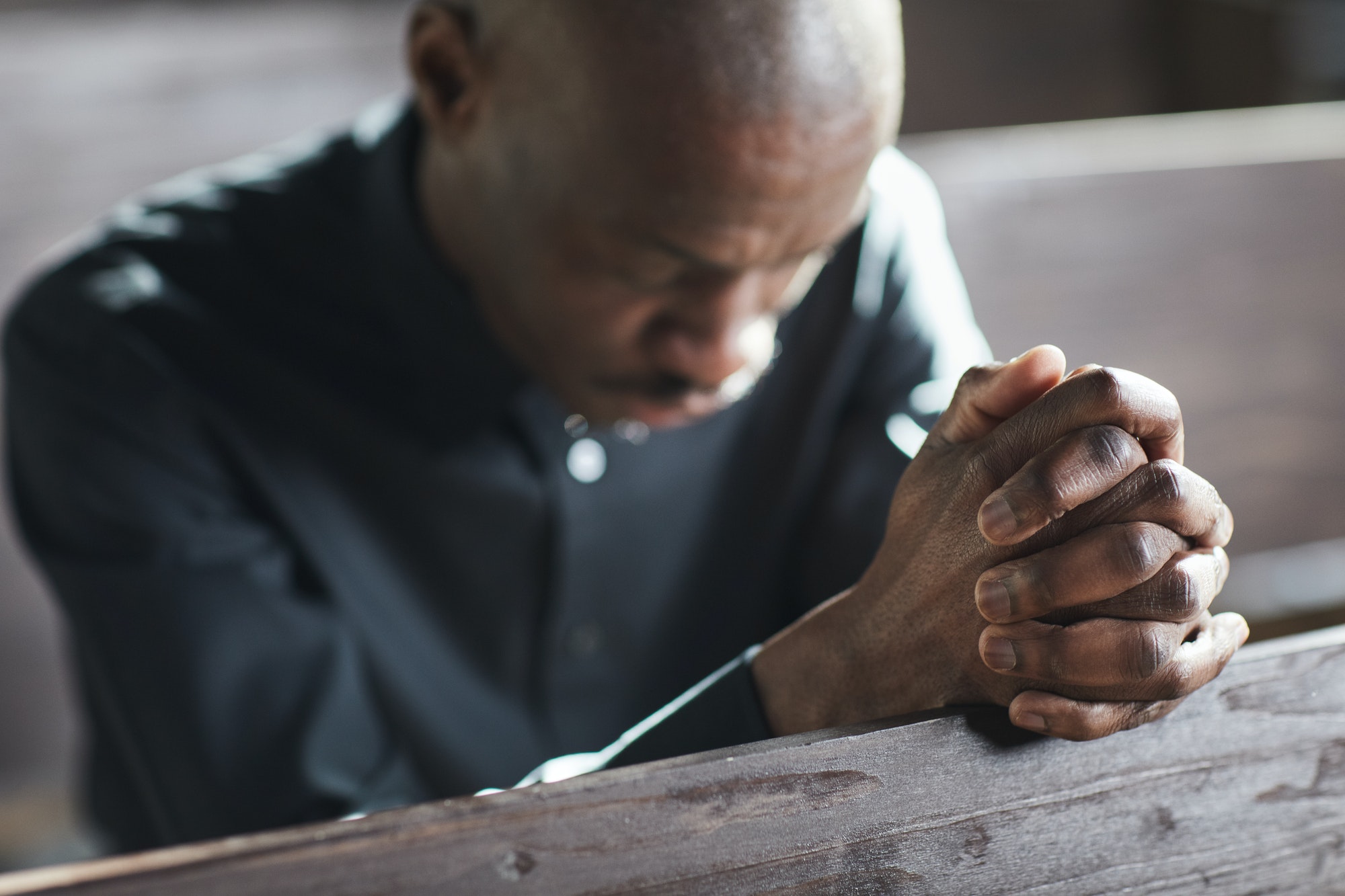 Man praying in church